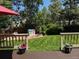 Well-maintained backyard with a deck and lush lawn at 18655 E Garden Pl, Aurora, CO 80015