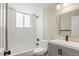 Bathroom features include a shower over tub with white subway tile and modern vanity with storage at 3177 S Grant St, Englewood, CO 80113