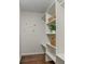 Walk-in closet features custom shelving for optimal storage space and organization at 3177 S Grant St, Englewood, CO 80113