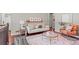 Cozy living room with hardwood floors, neutral decor and a stylish sitting area at 3177 S Grant St, Englewood, CO 80113