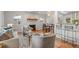 Inviting living room with hardwood floors, a fireplace, and an open layout perfect for entertaining and relaxation at 5315 Newland St, Arvada, CO 80002