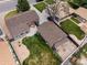 Aerial view of a property showcasing the house, backyard, neighboring homes and street layout at 160 Northglenn Dr, Northglenn, CO 80233