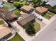 Charming single-story home with a well-manicured lawn and a detached garage, as seen from an aerial view at 160 Northglenn Dr, Northglenn, CO 80233
