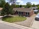 Charming home with a well-manicured lawn and beautiful curb appeal with a lovely stone feature at 160 Northglenn Dr, Northglenn, CO 80233