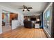 Spacious living room featuring hardwood floors, a ceiling fan, and an open layout at 160 Northglenn Dr, Northglenn, CO 80233