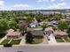 Neighborhood aerial showing the layout of homes, tree-lined streets, and proximity to local amenities at 160 Northglenn Dr, Northglenn, CO 80233