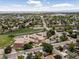 Community aerial showing homes in proximity to a local school, park, and surrounding residential areas at 160 Northglenn Dr, Northglenn, CO 80233