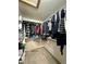 Walk-in closet with ample storage space and shelving at 395 Longspur Dr, Brighton, CO 80601