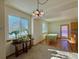 Bright dining area with large windows, offering plenty of natural light and a view of the outdoors at 395 Longspur Dr, Brighton, CO 80601