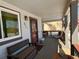 Inviting front porch features a bench, table, and chairs, creating a perfect spot for relaxation at 395 Longspur Dr, Brighton, CO 80601