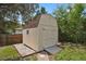 Exterior view of the backyard storage shed, offering practical space for tools and equipment at 4425 S Zang St, Morrison, CO 80465