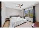 This bedroom provides neutral walls, carpet and a window for natural light at 5775 S Pagosa Way, Centennial, CO 80015