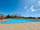 Community pool with a clear blue water, perfect for recreation and relaxation at 5775 S Pagosa Way, Centennial, CO 80015