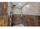 Tiled shower with pebble floor, built in bench and shampoo niches at 5775 S Pagosa Way, Centennial, CO 80015