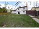 Large backyard featuring a wooden shed, well-maintained lawn, and easy access to the home at 530 S Laredo Cir, Aurora, CO 80017