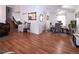 Open living spaces seamlessly combine living and dining areas, featuring hardwood floors and stairs at 530 S Laredo Cir, Aurora, CO 80017