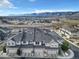 Beautiful aerial view of townhomes with attached garages and mountain views at 726 Vista Verde Hts, Monument, CO 80132