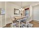 Dining area with stylish table set and elegant lighting fixture at 726 Vista Verde Hts, Monument, CO 80132