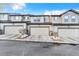 Exterior view of a set of garages, stone facade, and private drives at 726 Vista Verde Hts, Monument, CO 80132