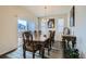 Inviting dining room filled with natural light, perfect for Gathering meals and gatherings at 10057 Granby St, Commerce City, CO 80022