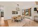 Elegant dining room features modern lighting, a large window with views, and stylish decor at 24140 Us Highway 40, Golden, CO 80401
