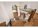 Grand foyer with hardwood floors, antler chandelier, and a staircase at 24140 Us Highway 40, Golden, CO 80401