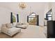 Bright sitting room offering large windows, vaulted ceiling, and balcony access at 24140 Us Highway 40, Golden, CO 80401