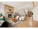 Inviting living room with a stone fireplace, stylish furniture, and an open layout for entertaining at 24140 Us Highway 40, Golden, CO 80401