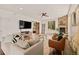 Inviting living room with a stone fireplace, wood floors, and comfortable seating at 24140 Us Highway 40, Golden, CO 80401