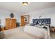 Bedroom with large bed and built in dresser at 18981 E Belleview Pl, Centennial, CO 80015