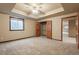 Comfortable bedroom with carpeted floor and a large closet at 18981 E Belleview Pl, Centennial, CO 80015