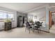 Small dining area with a table and chairs near a kitchen at 18981 E Belleview Pl, Centennial, CO 80015