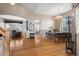 Dining room with hardwood floors and views to living room and kitchen at 18981 E Belleview Pl, Centennial, CO 80015