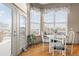 Kitchen nook with glass table and chairs, access to backyard at 18981 E Belleview Pl, Centennial, CO 80015