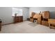 Home office with built-in wooden desk and shelving at 18981 E Belleview Pl, Centennial, CO 80015