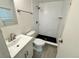 A stylish bathroom featuring a walk-in shower, modern fixtures, and tile floors at 8480 Adams Way, Denver, CO 80229