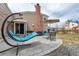 Patio with seating area and built-in brick fireplace at 5317 E 112Th Ct, Thornton, CO 80233