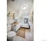 Bathroom featuring a tub, neutral walls, and vanity at 2636 W 27Th Ave, Denver, CO 80211