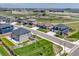 A neighborhood aerial view shows well-kept lawns, tree-lined streets, and a peaceful suburban setting at 13315 Xanthia St, Thornton, CO 80602