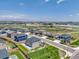 A bird's-eye view of a neighborhood with manicured lawns and homes at 13315 Xanthia St, Thornton, CO 80602