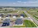 A suburban neighborhood aerial view with sports fields in the distance at 13315 Xanthia St, Thornton, CO 80602