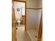 Bathroom with a shower and tile floor at 26452 Wolverine Trl, Evergreen, CO 80439