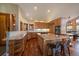 Beautiful kitchen with wood cabinets, granite countertops, stainless steel appliances, and hardwood floors at 26452 Wolverine Trl, Evergreen, CO 80439