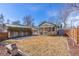 Lovely backyard and patio with a small storage shed and an interesting stone birdhouse at 1804 S Corona St, Denver, CO 80210