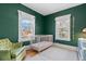 Green Bedroom features two windows and a neutral color scheme at 1804 S Corona St, Denver, CO 80210