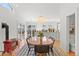 A spacious dining area featuring a wood-burning stove and access to the patio at 1804 S Corona St, Denver, CO 80210