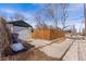 Detached two car garage with a driveway at 1804 S Corona St, Denver, CO 80210