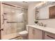 Bright bathroom featuring updated shower, vanity, and modern fixtures at 7665 E Eastman Ave # 111A, Denver, CO 80231