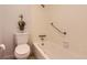 Bathroom with shower and bathtub combination plus accessibility features at 7665 E Eastman Ave # 111A, Denver, CO 80231