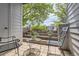 Outdoor patio with seating area and view of the landscape and stairwell at 7665 E Eastman Ave # 111A, Denver, CO 80231